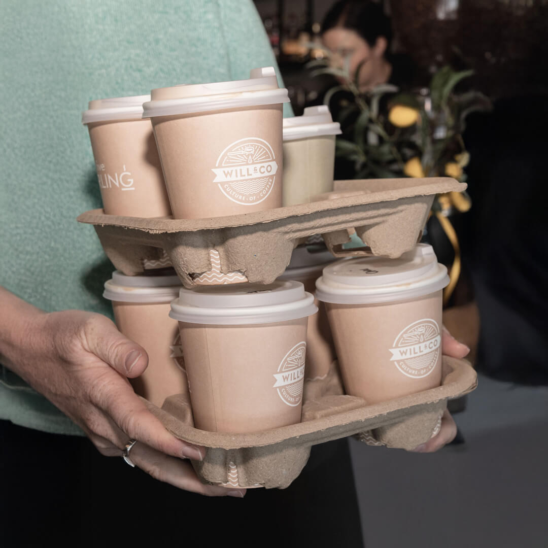 Barista-made takeaway coffees in branded cups for corporate catering by Thirty Five Stirling café in Thebarton, Adelaide.