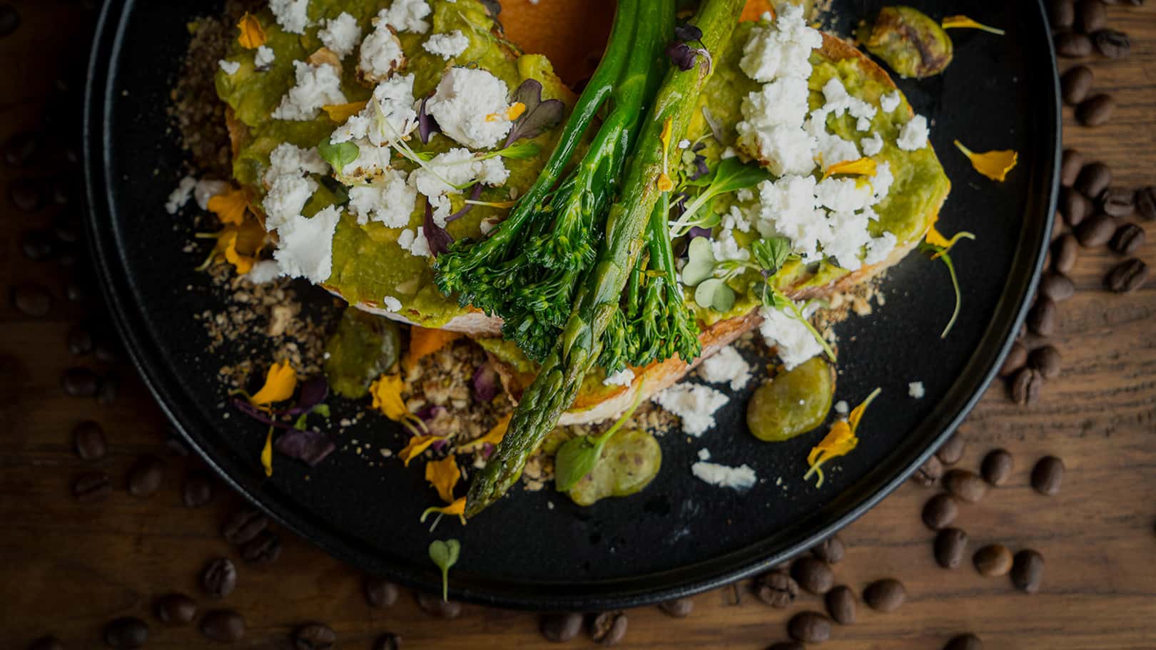 Close-up of avocado toast topped with broccolini, feta, and seasonal vegetables at Thirty Five Stirling café in Thebarton, Adelaide.